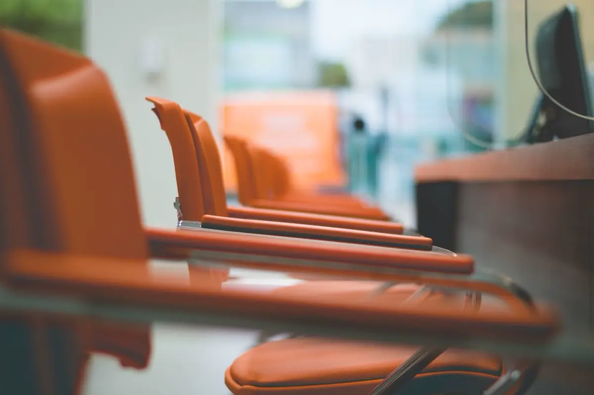 Row of contract-grade commercial office chairs of the type covered by ANSI/BIFMA testing