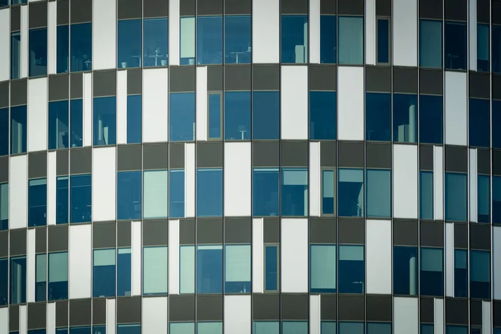 Glazed office building facade illustrating California Title 24 lighting and glazing requirements for China-sourced products