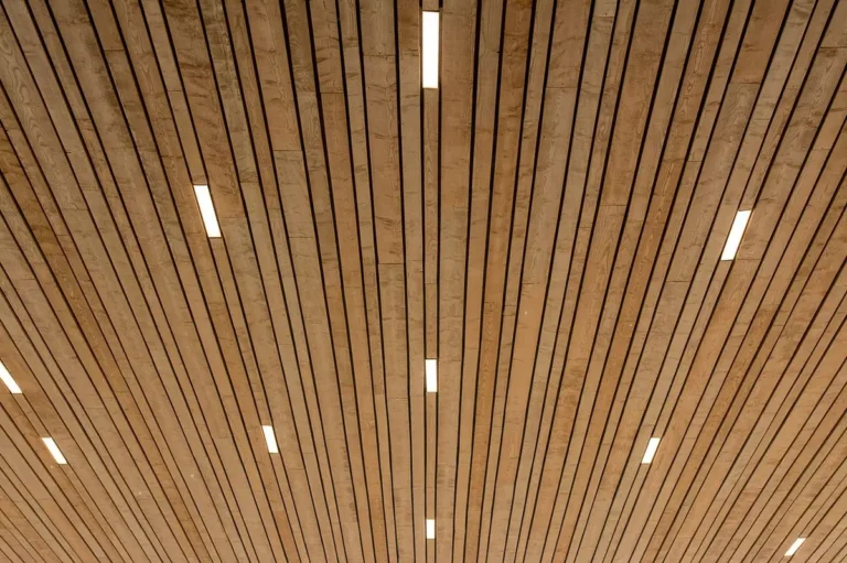 Wood slat wall and ceiling panels in a commercial interior - Class A flame spread wall panels from China for US projects