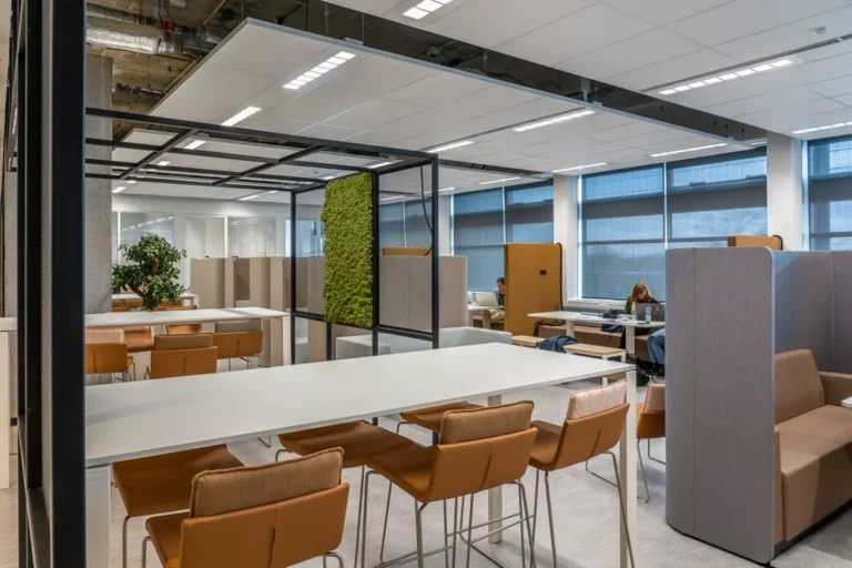 co-working space fit-out with workstations and acoustic booths sourced from china