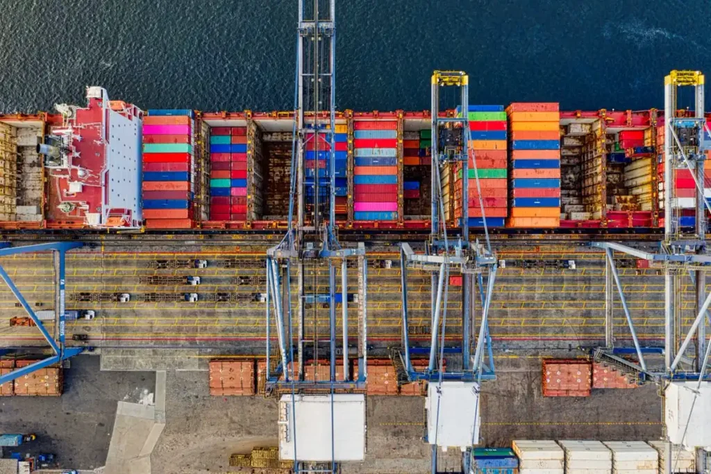 Container terminal handling a project import from China, illustrating who clears customs