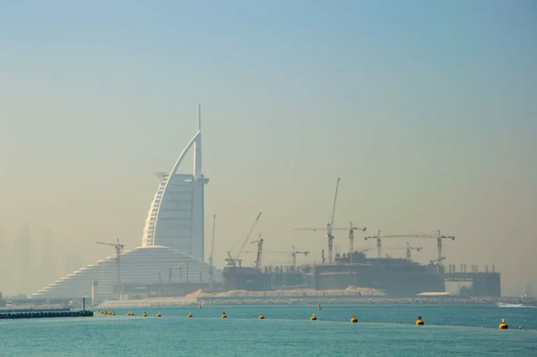 Dubai construction site with tower cranes - UAE contractors sourcing building materials from China