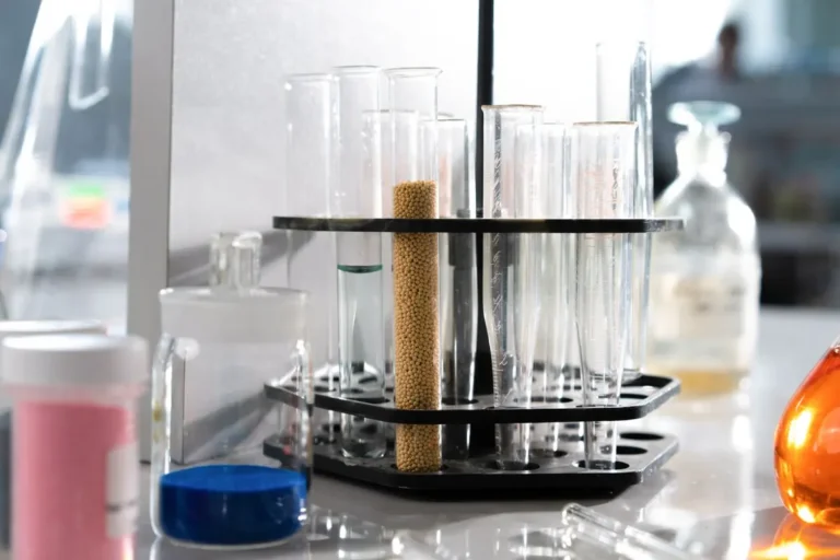 Accredited laboratory bench with test tubes — factory test reports vs accredited lab testing for building materials