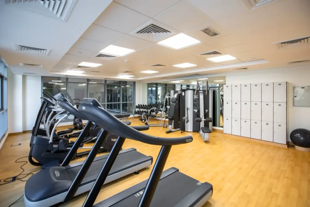 Commercial gym fit-out sourcing from China - fitness center interior with equipment and lockers