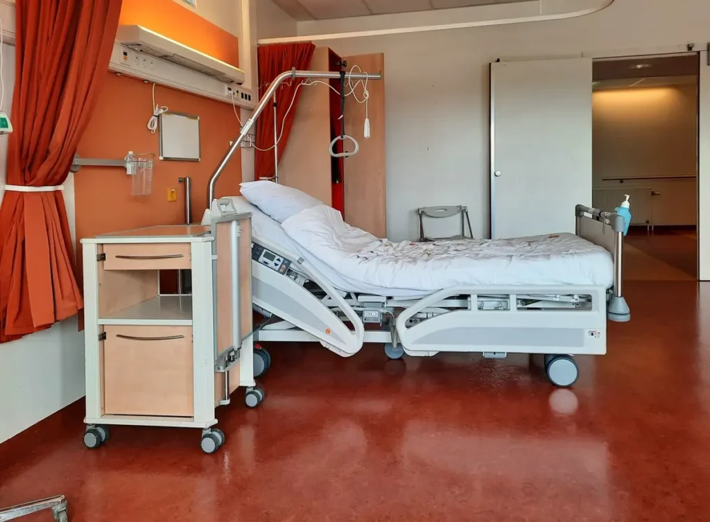 Hospital patient room with bedside cabinet furniture sourced from China
