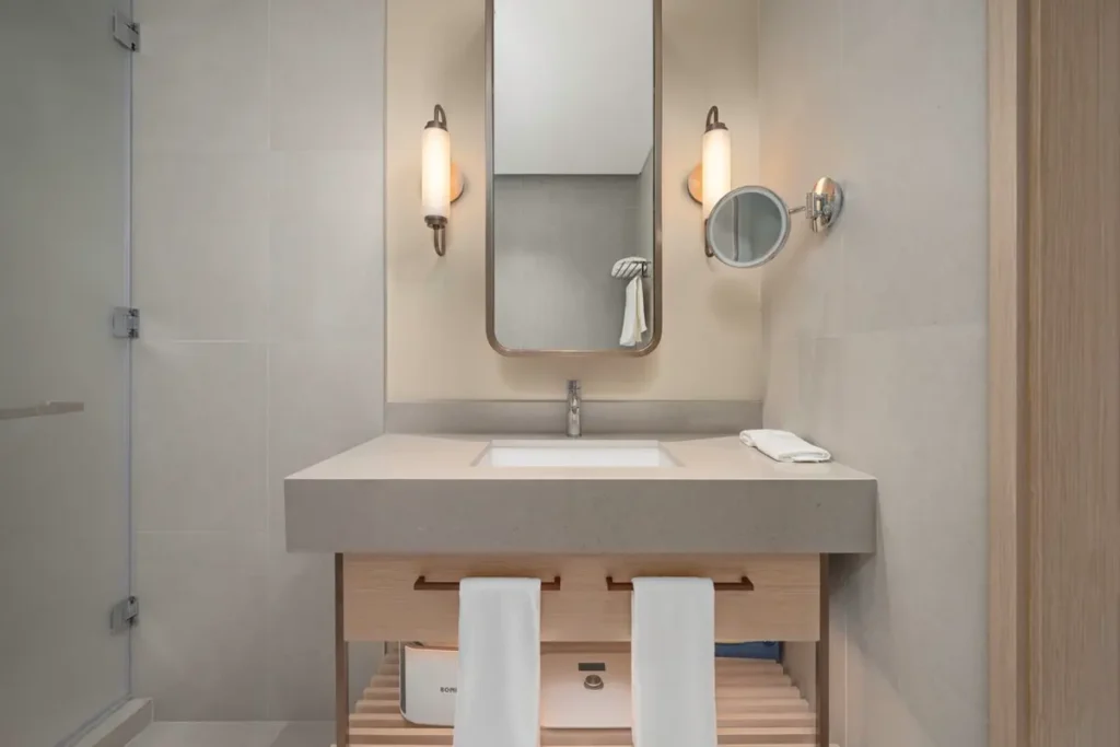 Hotel bathroom vanity with stone countertop and mirror - bathroom vanity sourcing from China