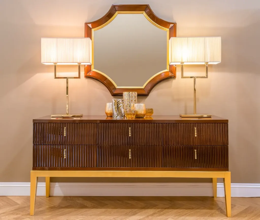Wood-finished hotel casegood showing the laminate vs veneer hotel furniture decision