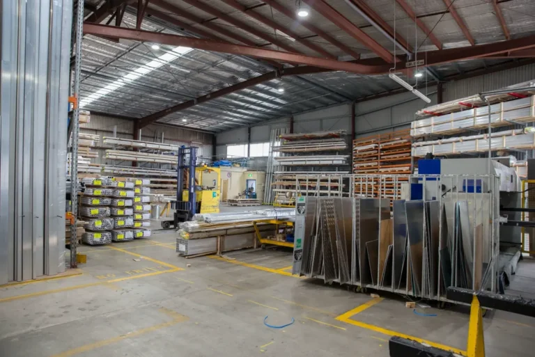 Aluminum fabrication warehouse illustrating factory-direct manufacturing sourcing in China