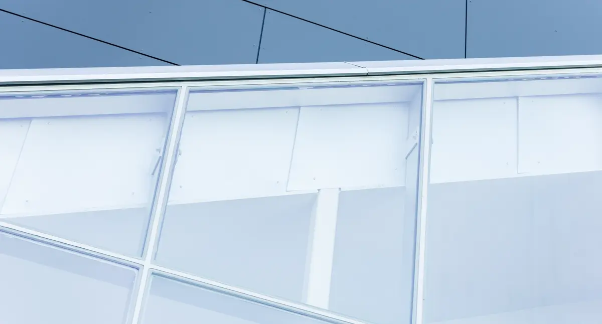 Commercial building window glazing for motorized roller blind and shading systems
