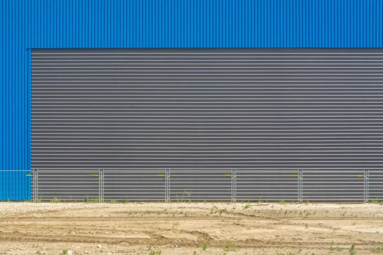 Insulated corrugated metal panel envelope on a warehouse and industrial building