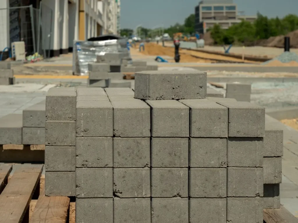 Concrete blocks stacked on a European construction site, illustrating how German and Dutch contractors source building materials from China