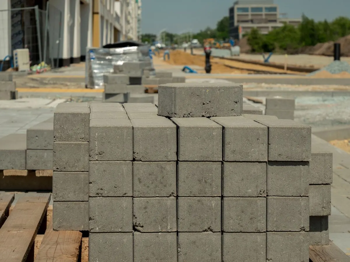 Concrete blocks stacked on a European construction site, illustrating how German and Dutch contractors source building materials from China