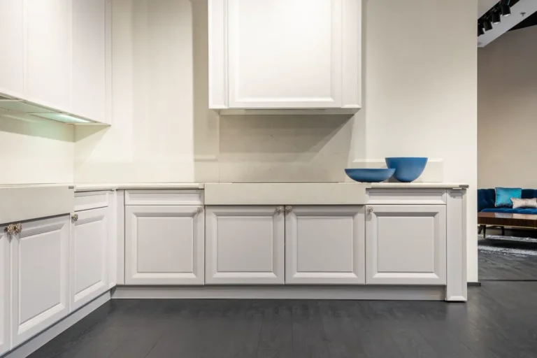 White kitchen cabinet units in a showroom - kitchen cabinet manufacturers in China for Australian apartment and build-to-rent projects