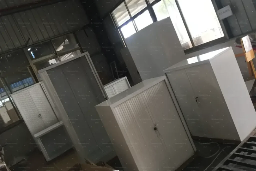 Metal storage cabinets in a factory before shipment, pharmacy and health retail chain fit-out sourcing from China