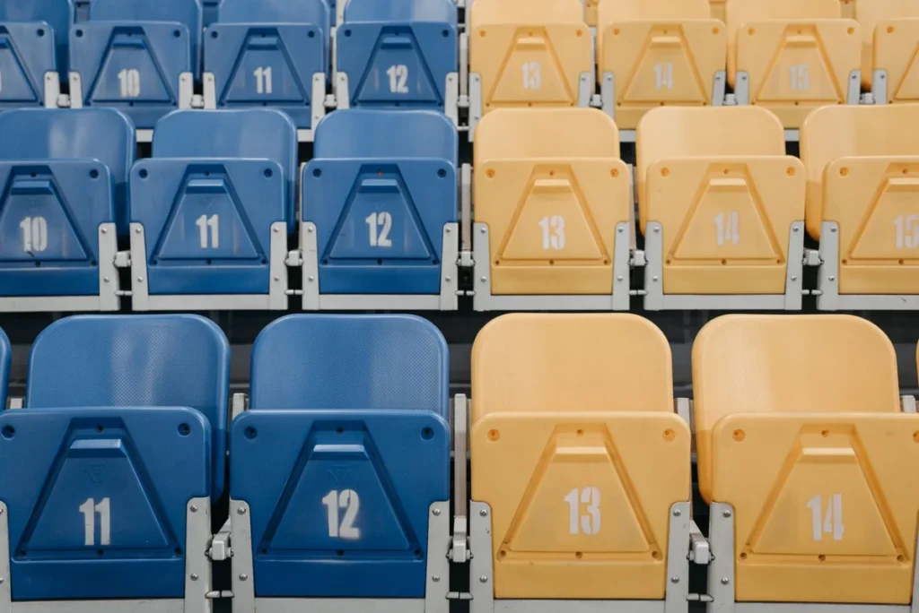 Stadium seating manufacturers in China: tip-up arena and grandstand seats installed on a stadium tier