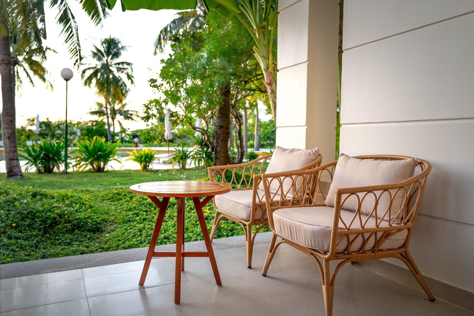 Synthetic rattan outdoor seating on a resort terrace