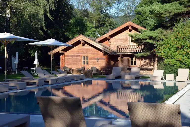 Resort swimming pool with tiled surround and loungers, swimming pool tile and equipment manufacturers in China