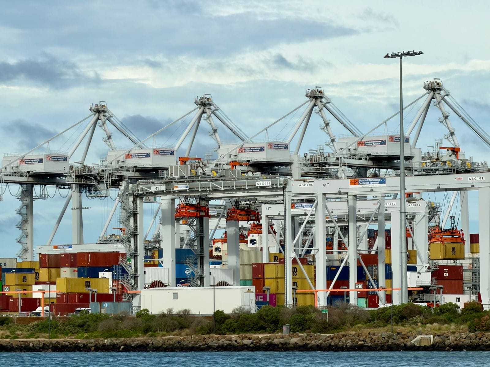 Container terminal with stacked boxes and gantry cranes