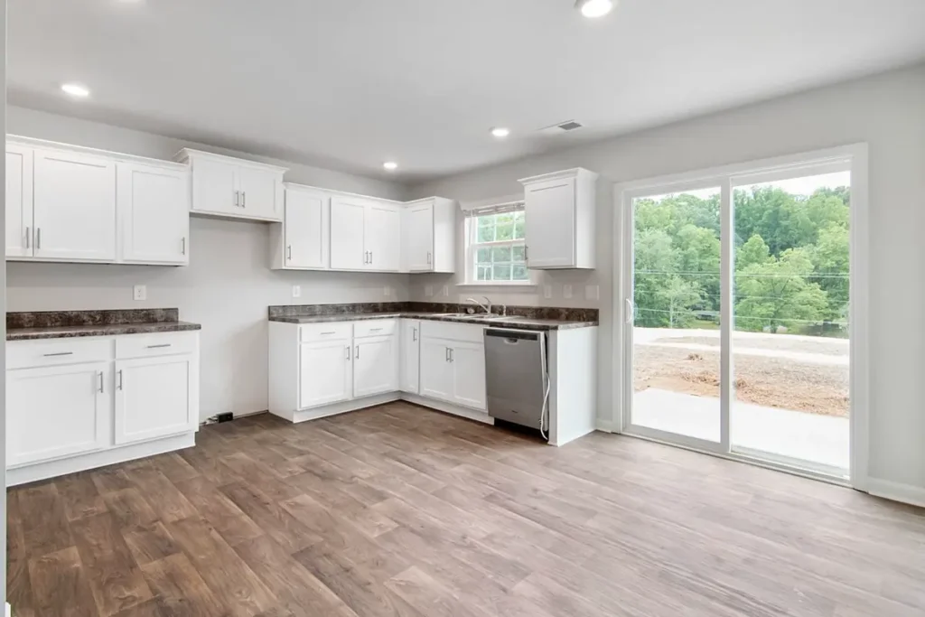 White fitted kitchen cabinets in a new-build home — kitchen cabinet manufacturers in China for UK housing and build-to-rent projects