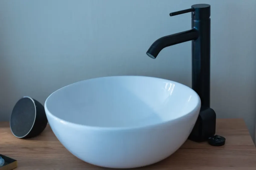 Basin mixer tap on a countertop basin - WELS rating on tapware and toilets from China for Australian projects