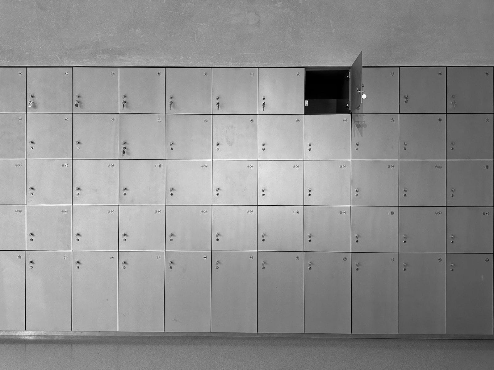 A wall of lockers in a commercial changing area