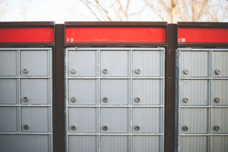 Parcel lockers and mailboxes for multifamily buildings, shown as a row of community mailboxes.