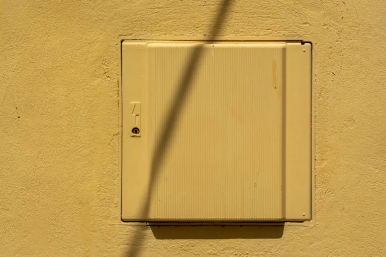 Closed electrical enclosure on a building wall