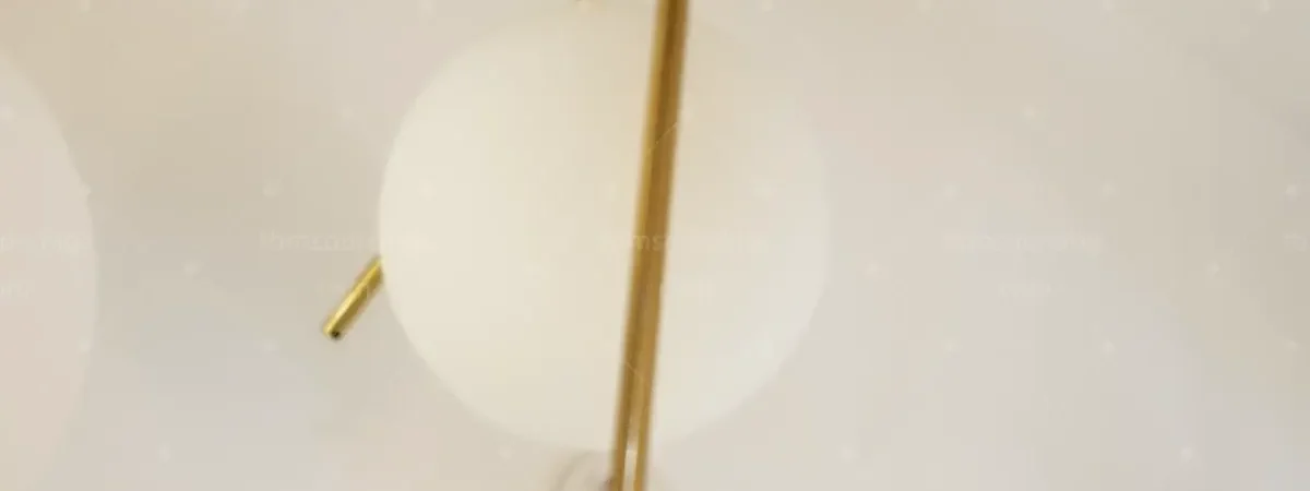Brass and opal glass pendant light inspected at China factory