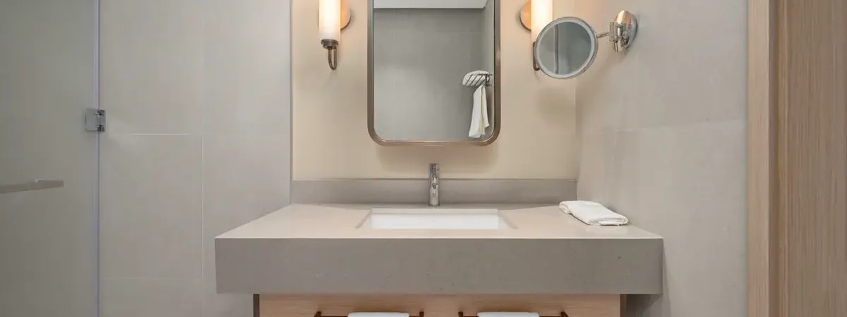Hotel bathroom vanity with stone countertop and mirror - bathroom vanity sourcing from China
