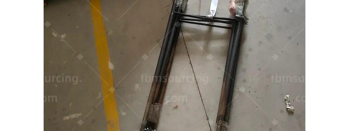 Street light pole components laid out for completeness check during QC
